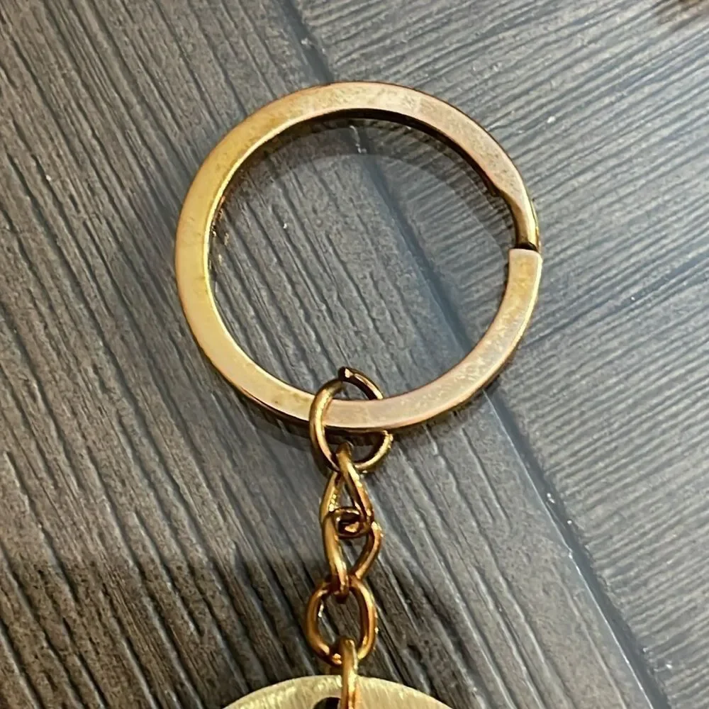 Orly “Do What Makes You Happy” Brass Keyring